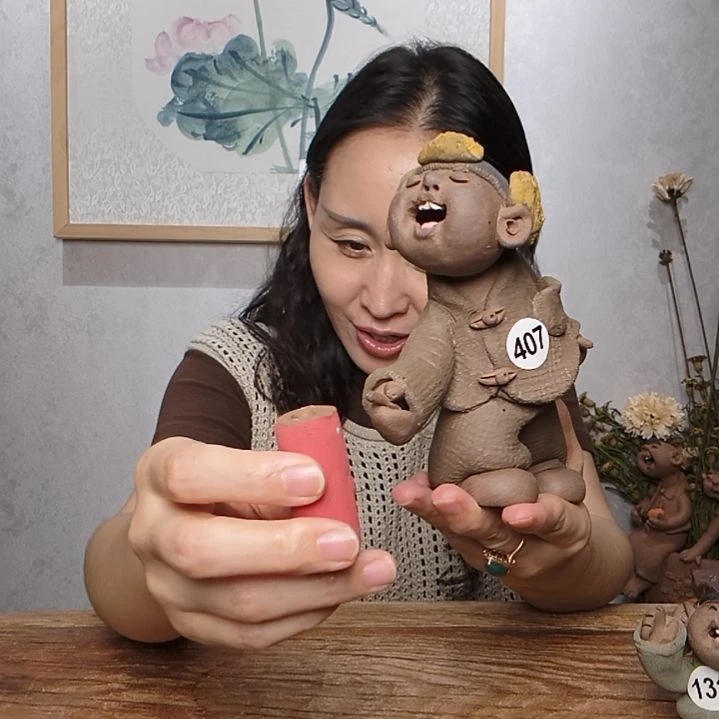紫砂不规则羲媧娃系列作品放炮男娃
