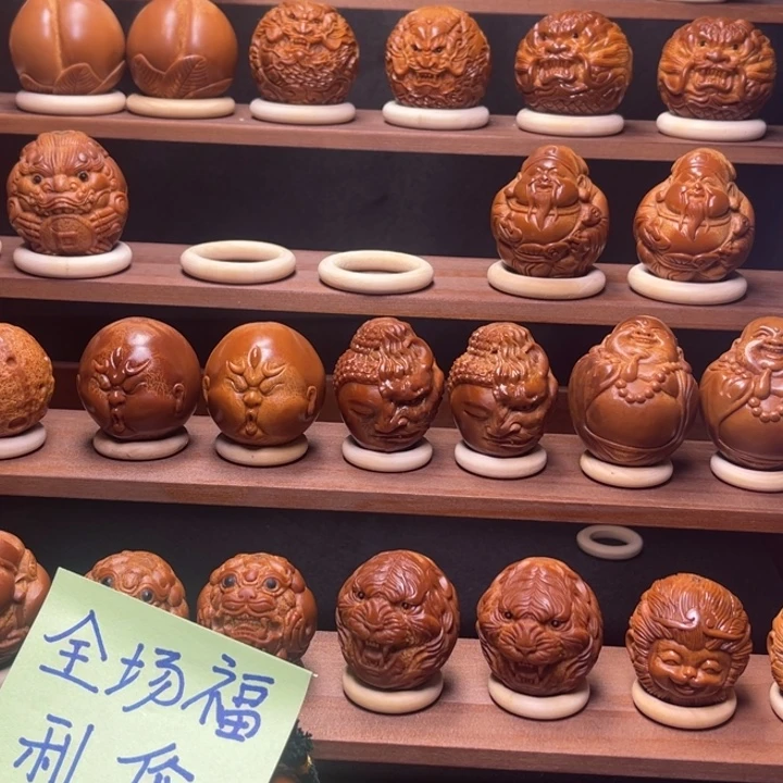 ****e橄榄核把件黑白无常