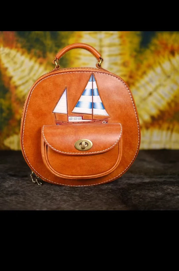 【草莓双肩包】皮雕帆船