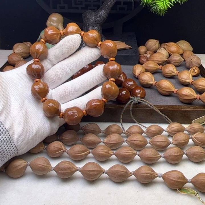 一***往手串/手链橄榄核1.9*2.0原皮三花蒜头铁核