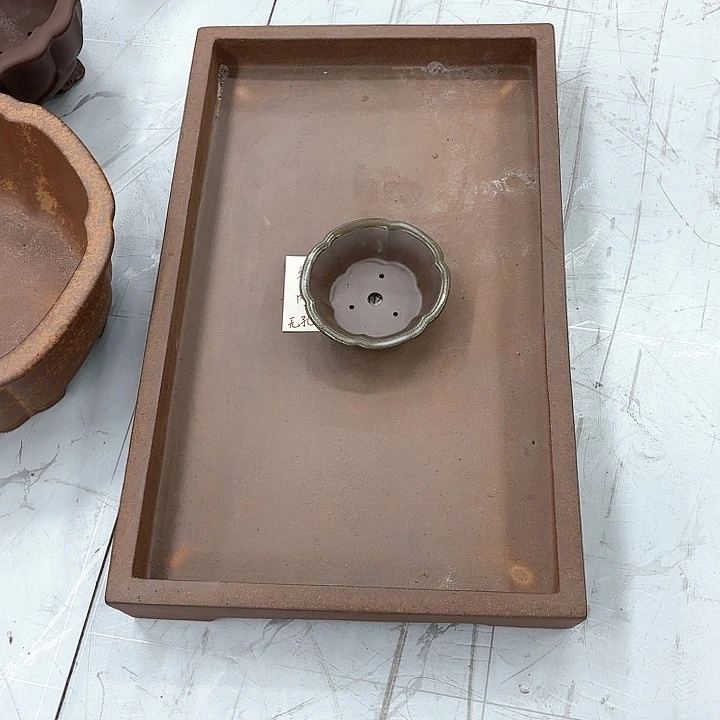 紫砂花盆，*谓紫砂等珍贵文物和