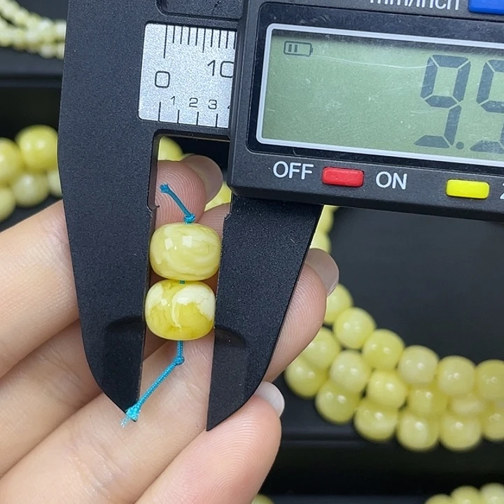 琥珀未镶嵌珠宝奇石俄料浓白蜡腰花老型对珠