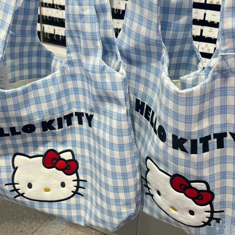 新款kitty夏天轻便百搭外出卡通手提包上班族杂物休闲包单肩包