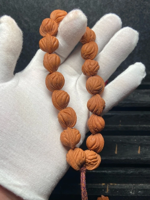 1.7厘米肚子秦岭野生龙纹桃核素串十八颗手持