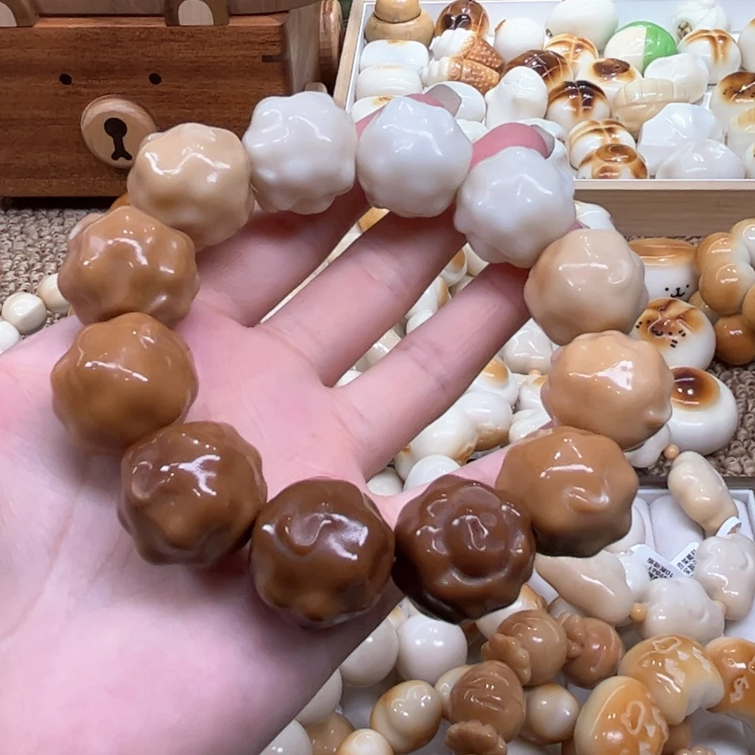 菩提根/象牙果手串9.26.18象牙果渐变绵羊微瑕