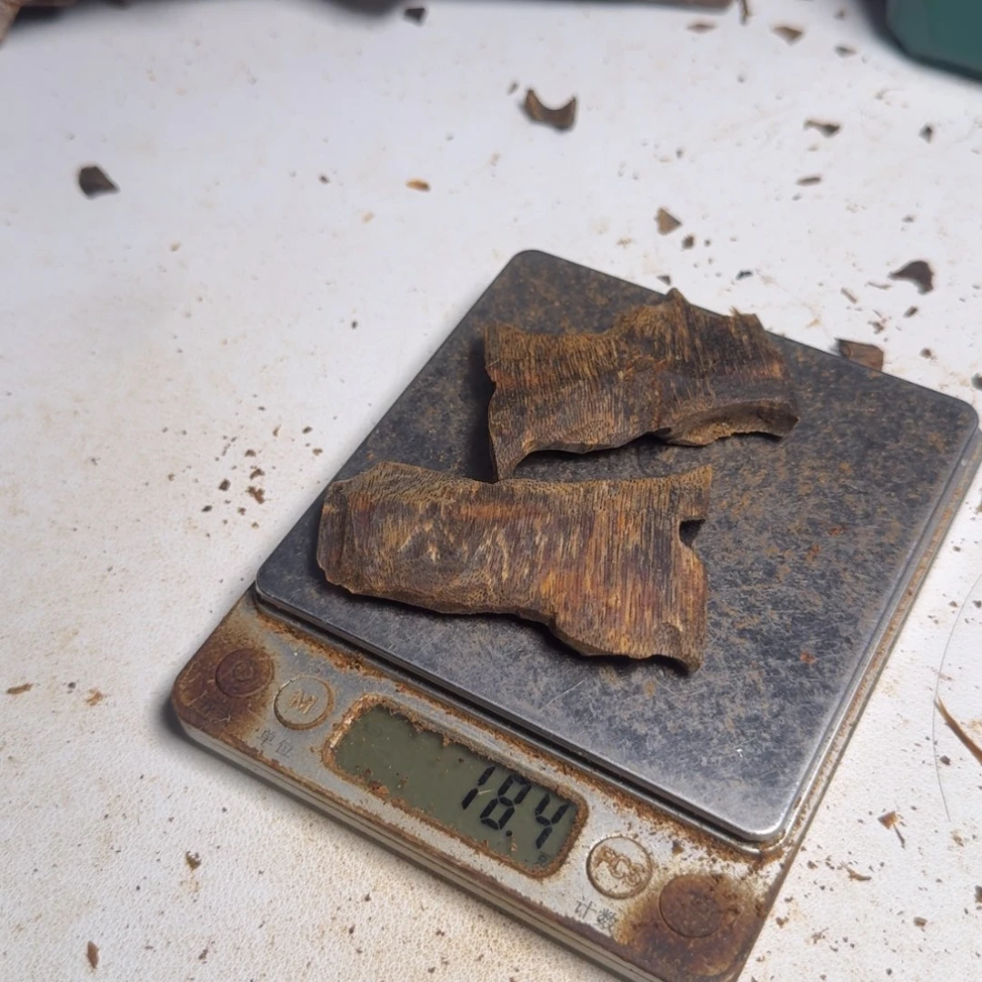 红***鱼楠木手把件老料18克