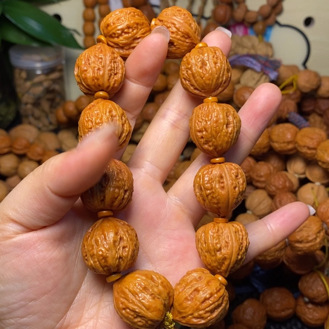 旭***_文玩核桃手串桃心蛙