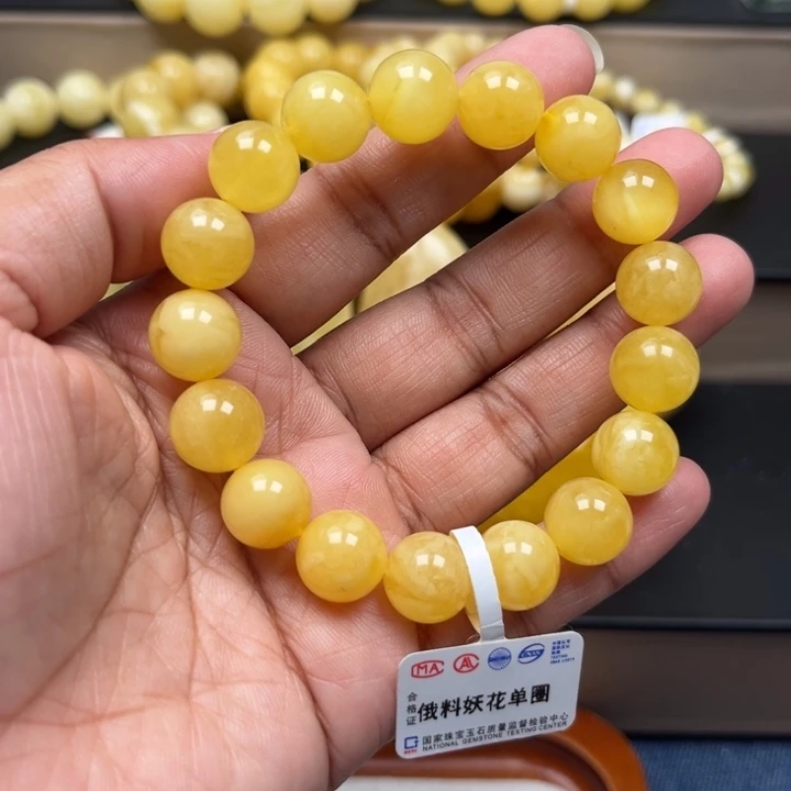琥珀未镶嵌珠宝奇石M87号11.9+鸡油黄妖花