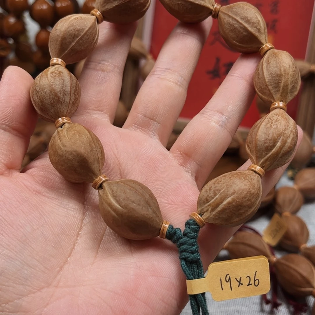 瑶***摇橄榄核手串梅林铁核19.26橄榄核