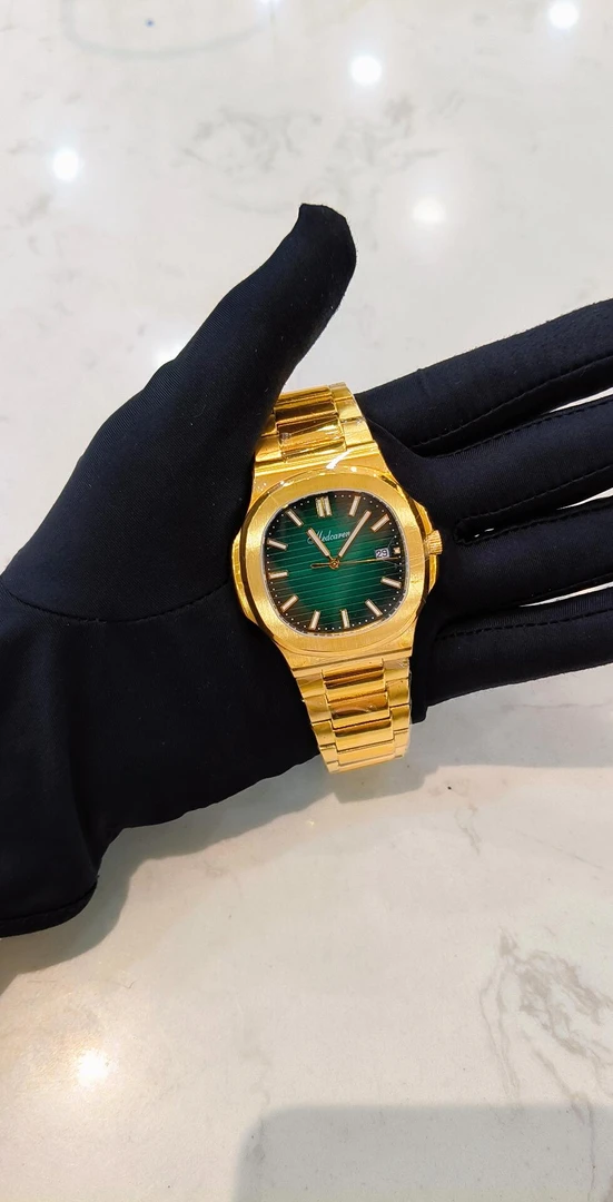 梅地卡伦-无钻祖母绿鹦鹉螺系列钢带男款（石英机芯0.1克）