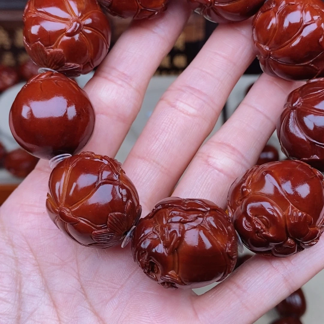 平***哥橄榄核吊坠荷叶财迷