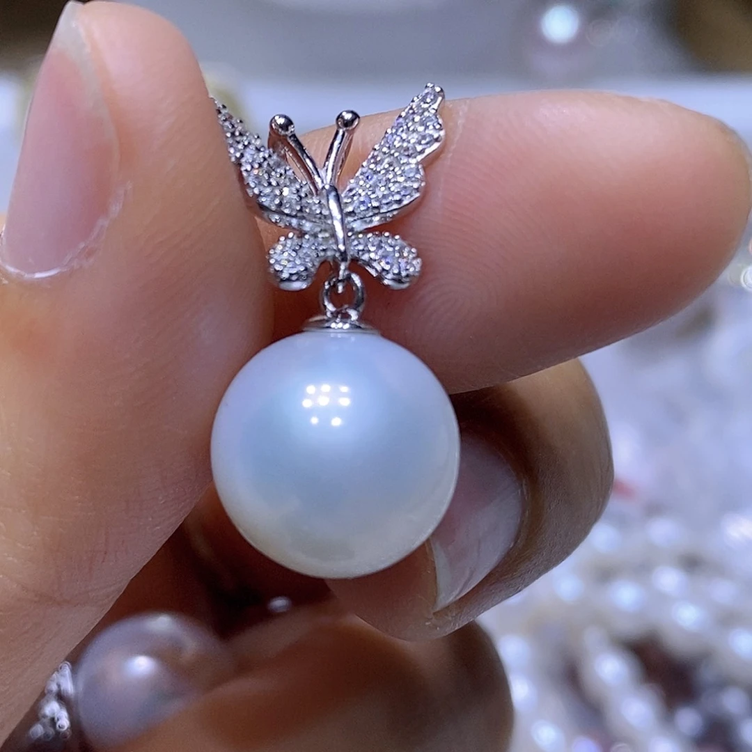 银S925镶嵌淡水珍珠吊坠旒**月