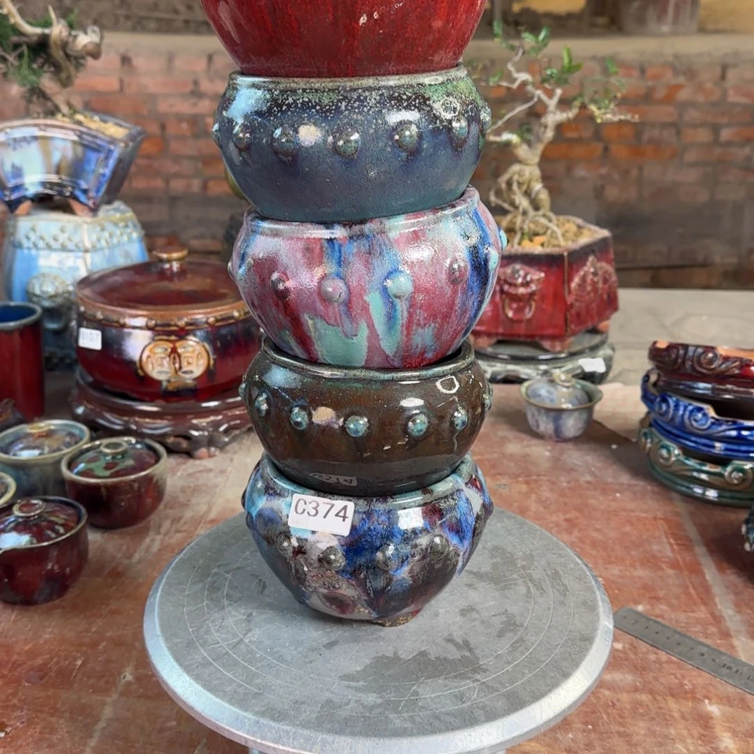 红泥花盆小*头374。