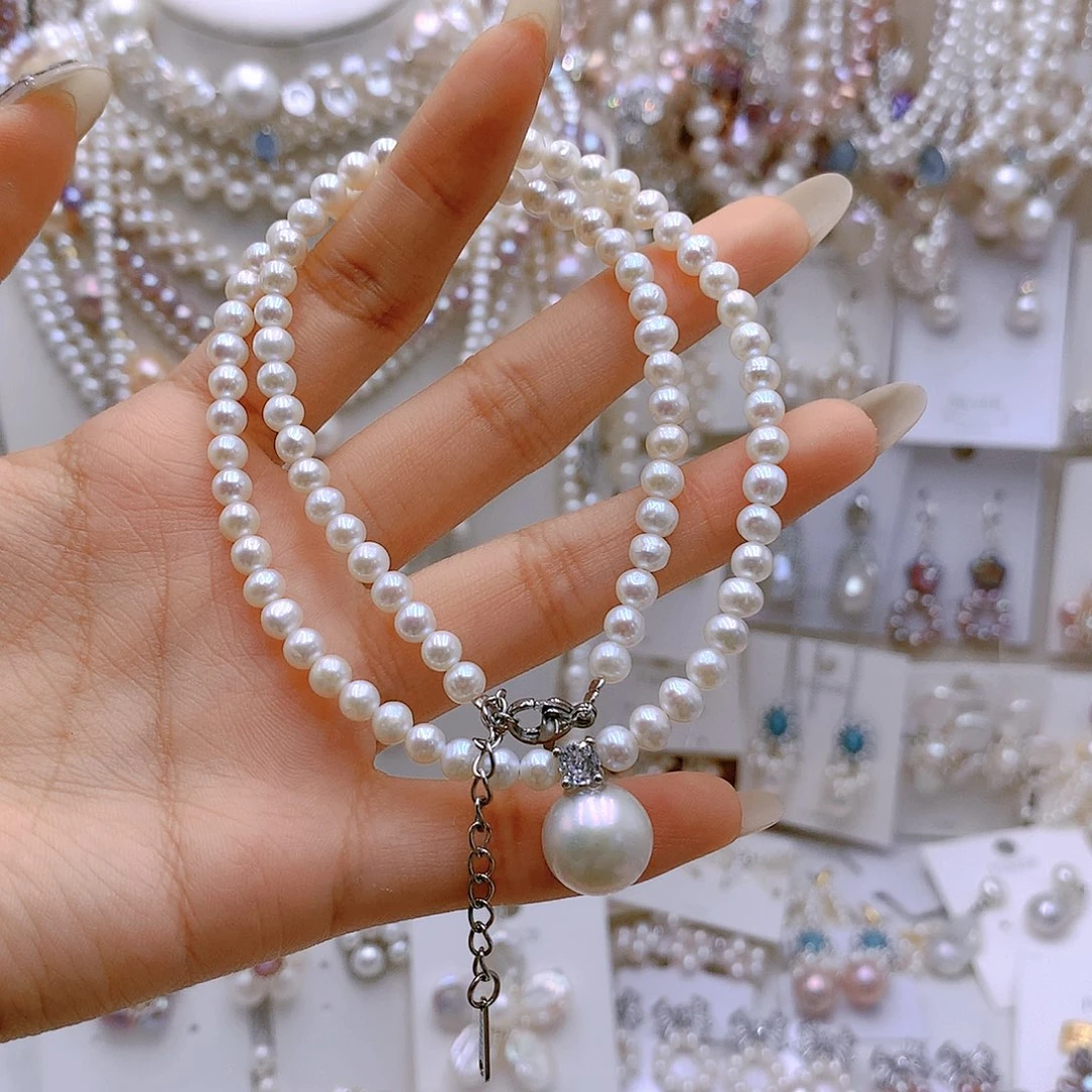 银S925镶嵌耳饰淡水珍珠泡****菜