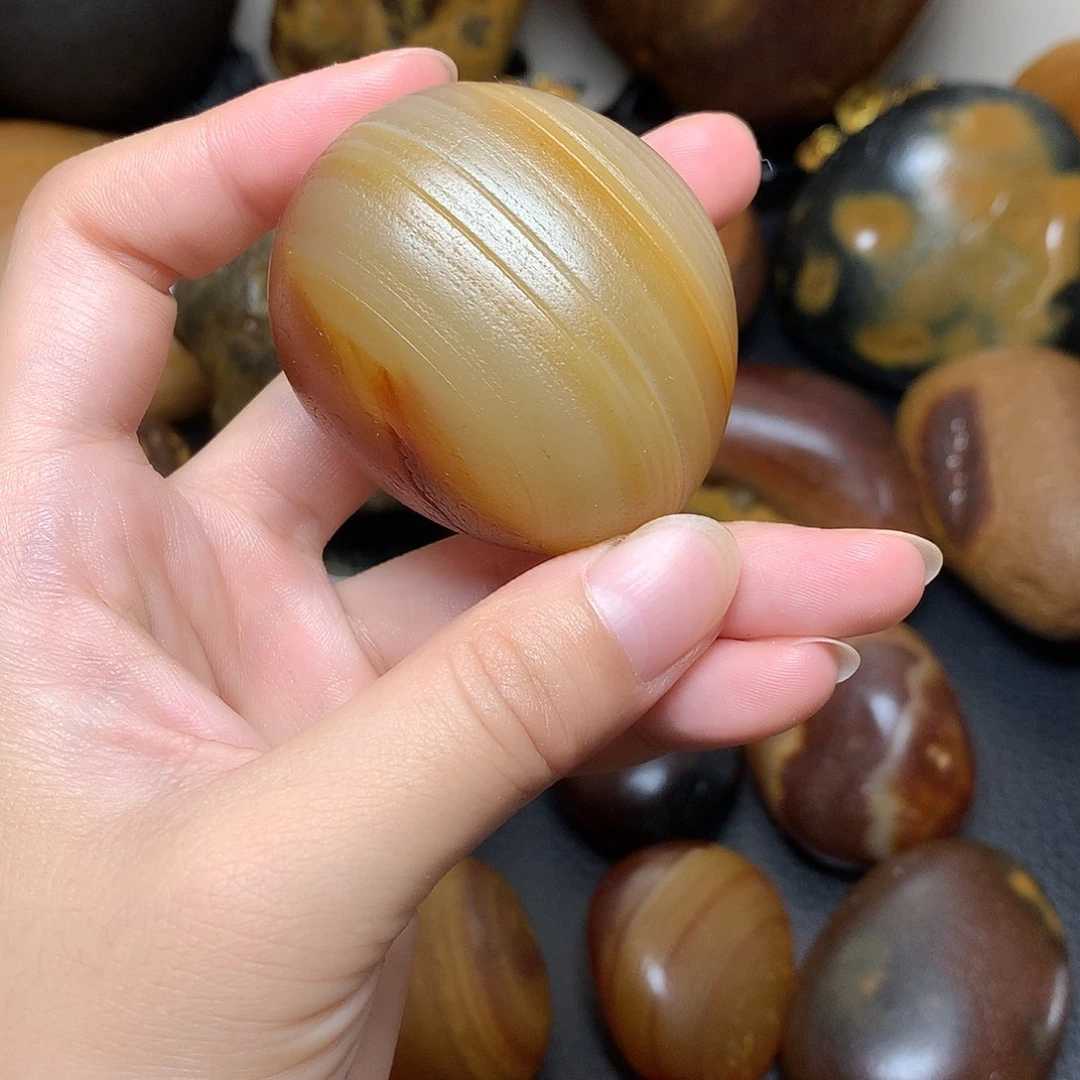 玛瑙原石花纹手把件