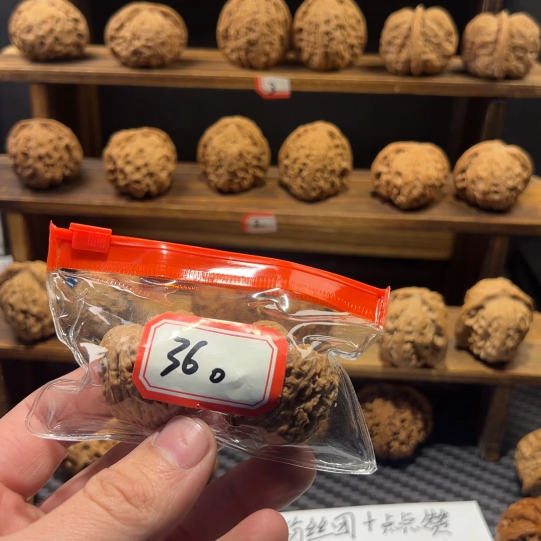 核桃把件2**.南疆石狮子头