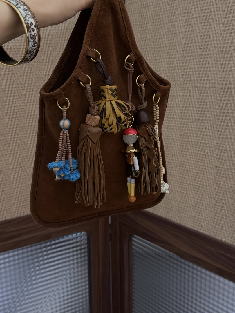 【沙漏包包】羊皮流苏挂件手提包 J25BB293