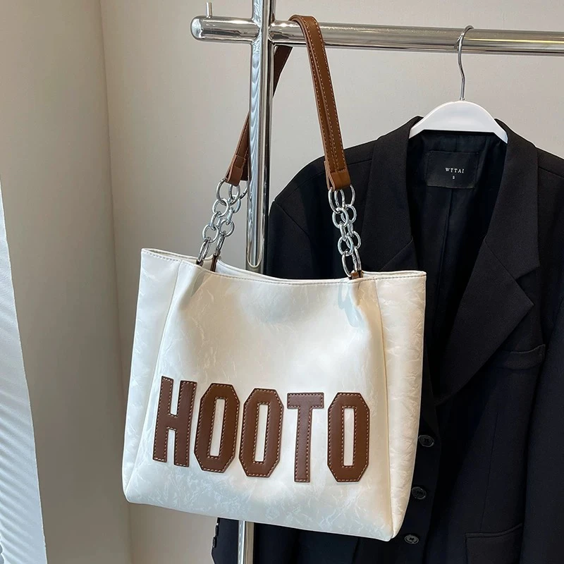 大容量包包女式2025新款高级感小众设计大学生上课通勤单肩托特包