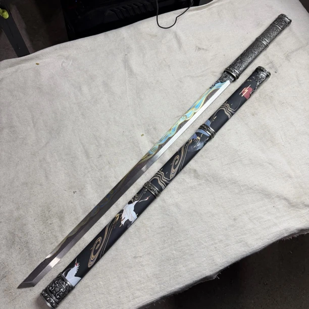 3252 龙泉昊天宝剑高锰钢锻打包皮鞘未开刃