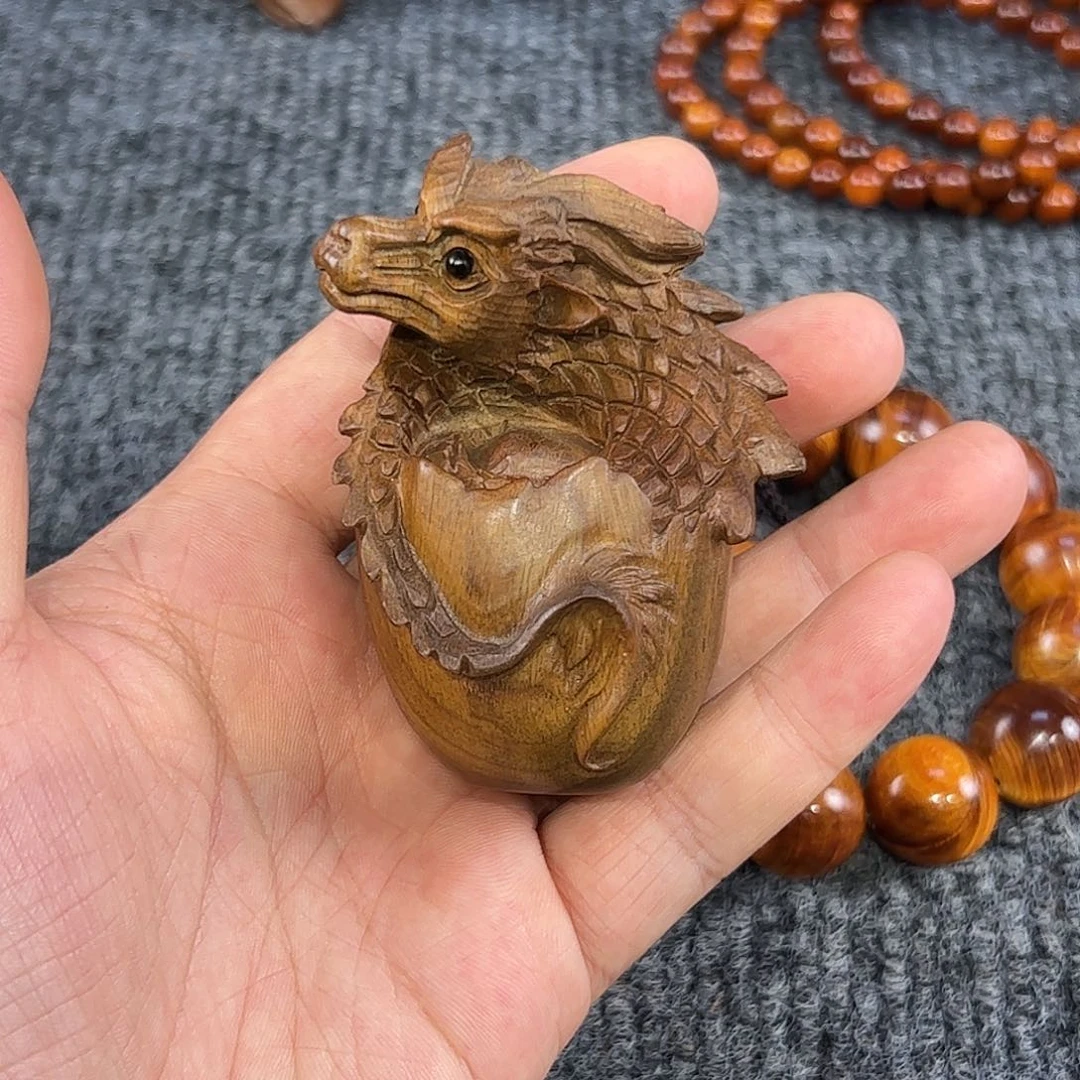 崖柏手工绿檀龙蛋