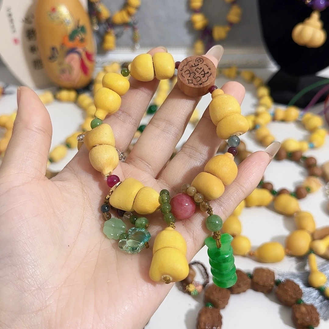 陈****素皮布袋手串手持350元