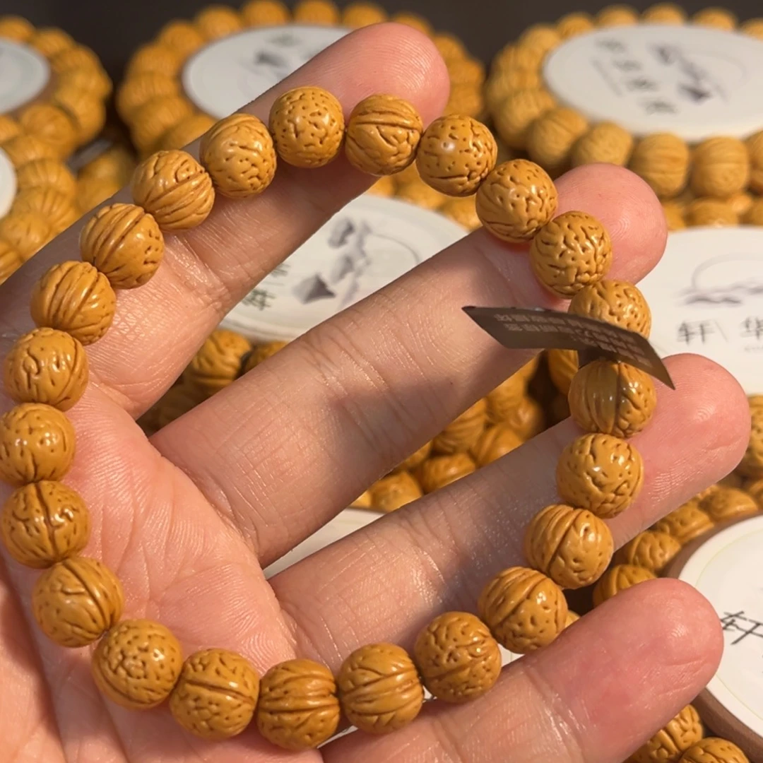 卖****手串龙脊菩提精品桃核小金豆