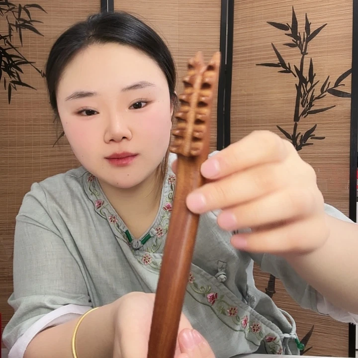 红檀木痒痒耙子瑕疵