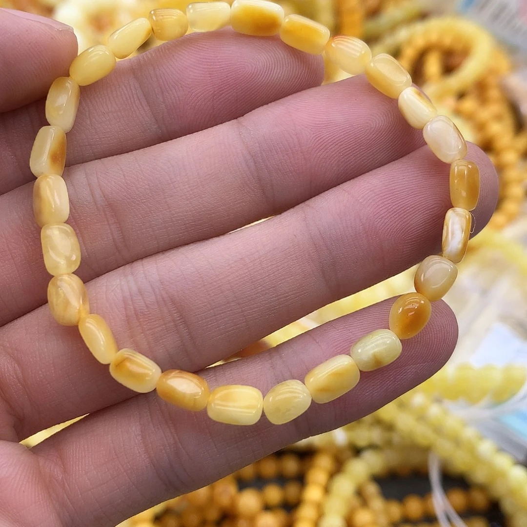 棉***果蜜蜡未镶嵌珠宝奇石