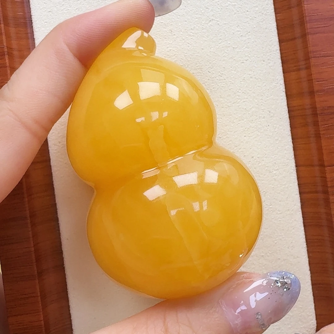 尔****琥珀未镶嵌珠宝奇石吊坠
