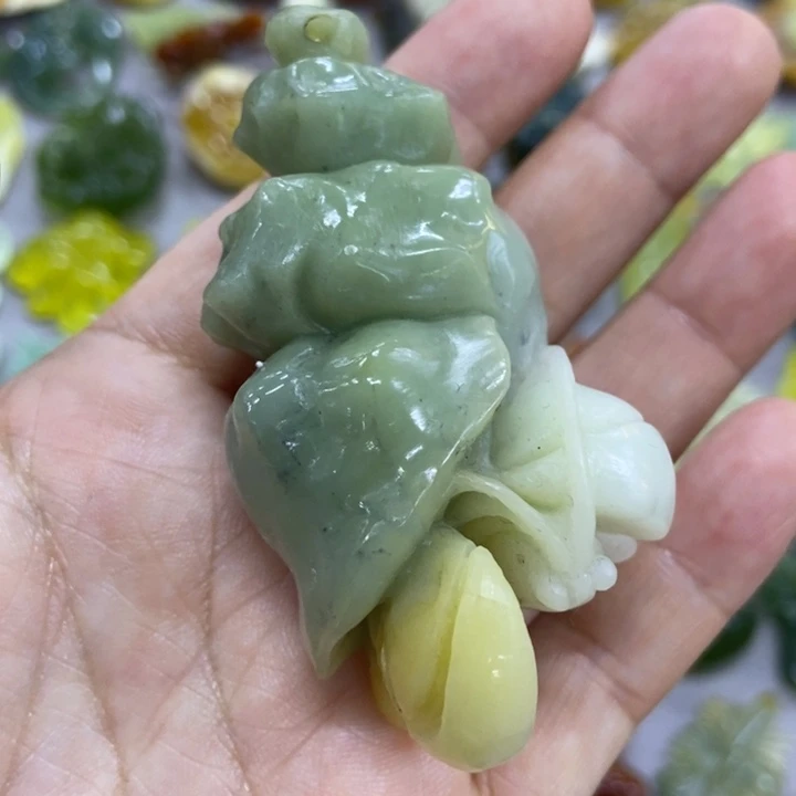 未镶嵌蛇纹石玉手把件