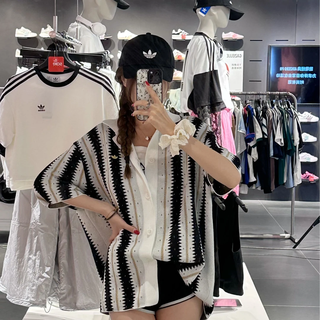 adidas/阿迪达斯T-SHIRT 休闲度假风运动宽松短袖翻领衬衫 KE5833