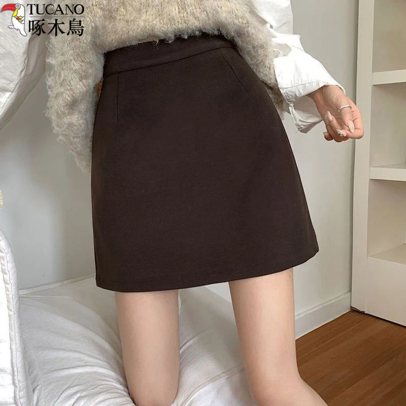 啄木鸟秋冬毛呢半身裙短裙高腰短裙秋冬女款爆款2025新款包臀裙