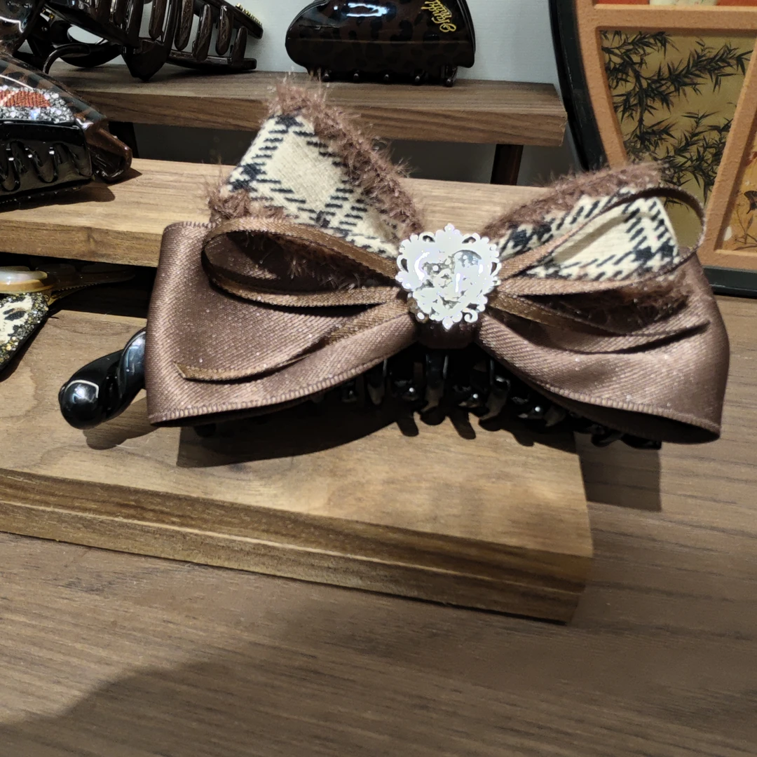 咖色天使蝴蝶结香蕉夹417 早儿