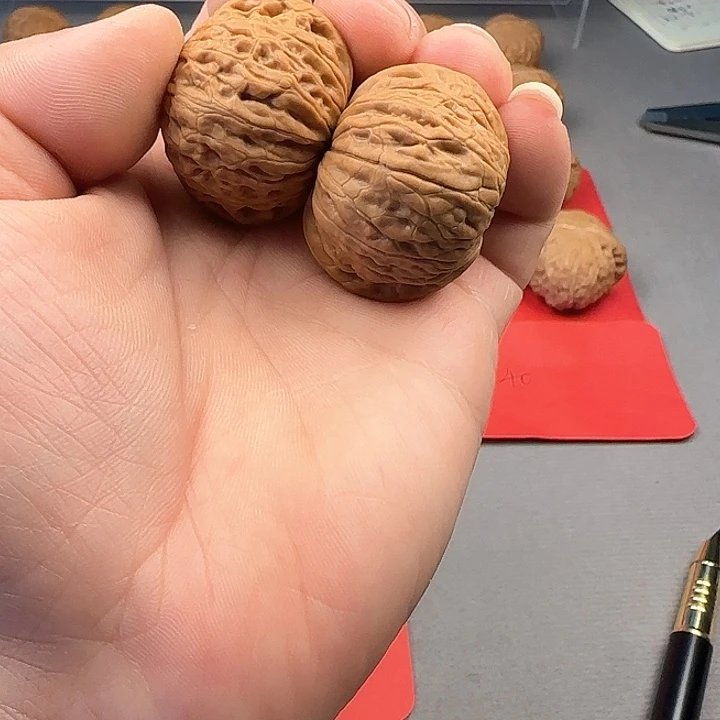 桃核把件j****念铁锤妹妹