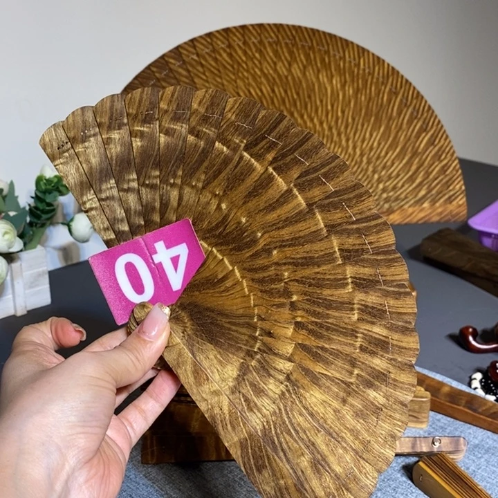 金丝楠流**球金丝楠木扇子