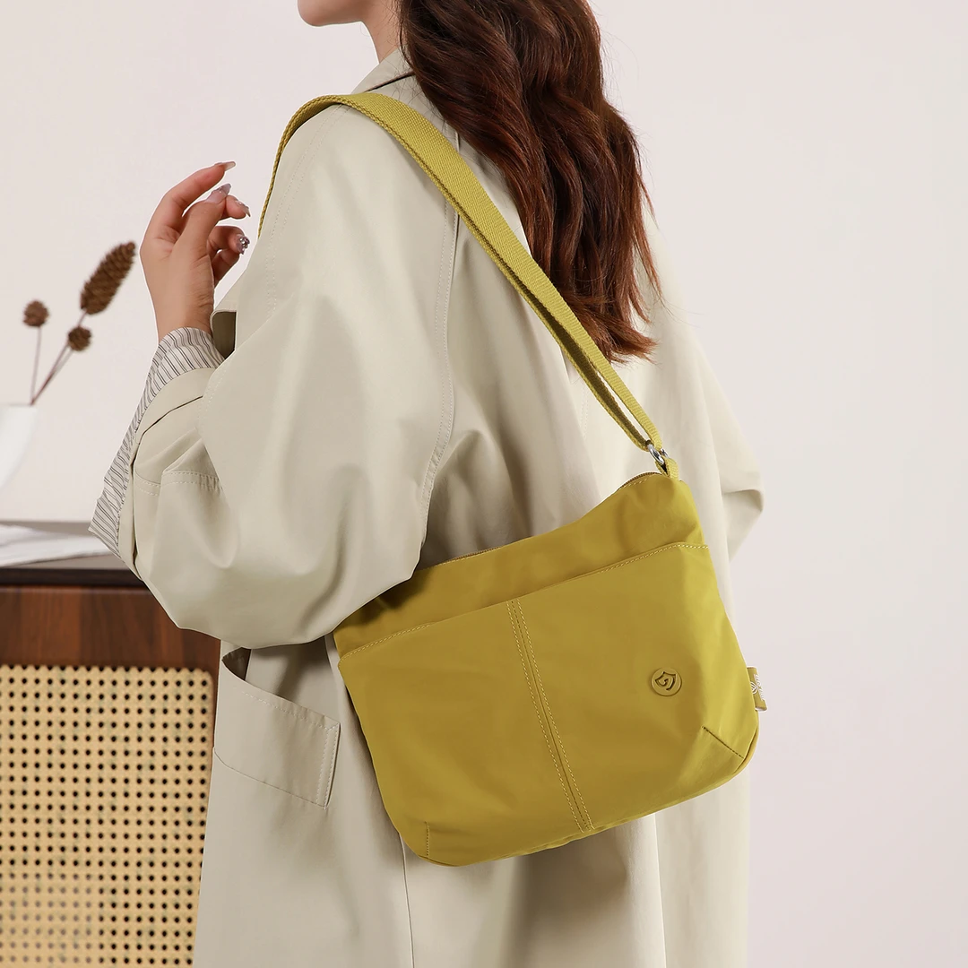 多口袋斜挎包女小包包2025新款百搭尼龙防水单肩小挎包通勤帆布包