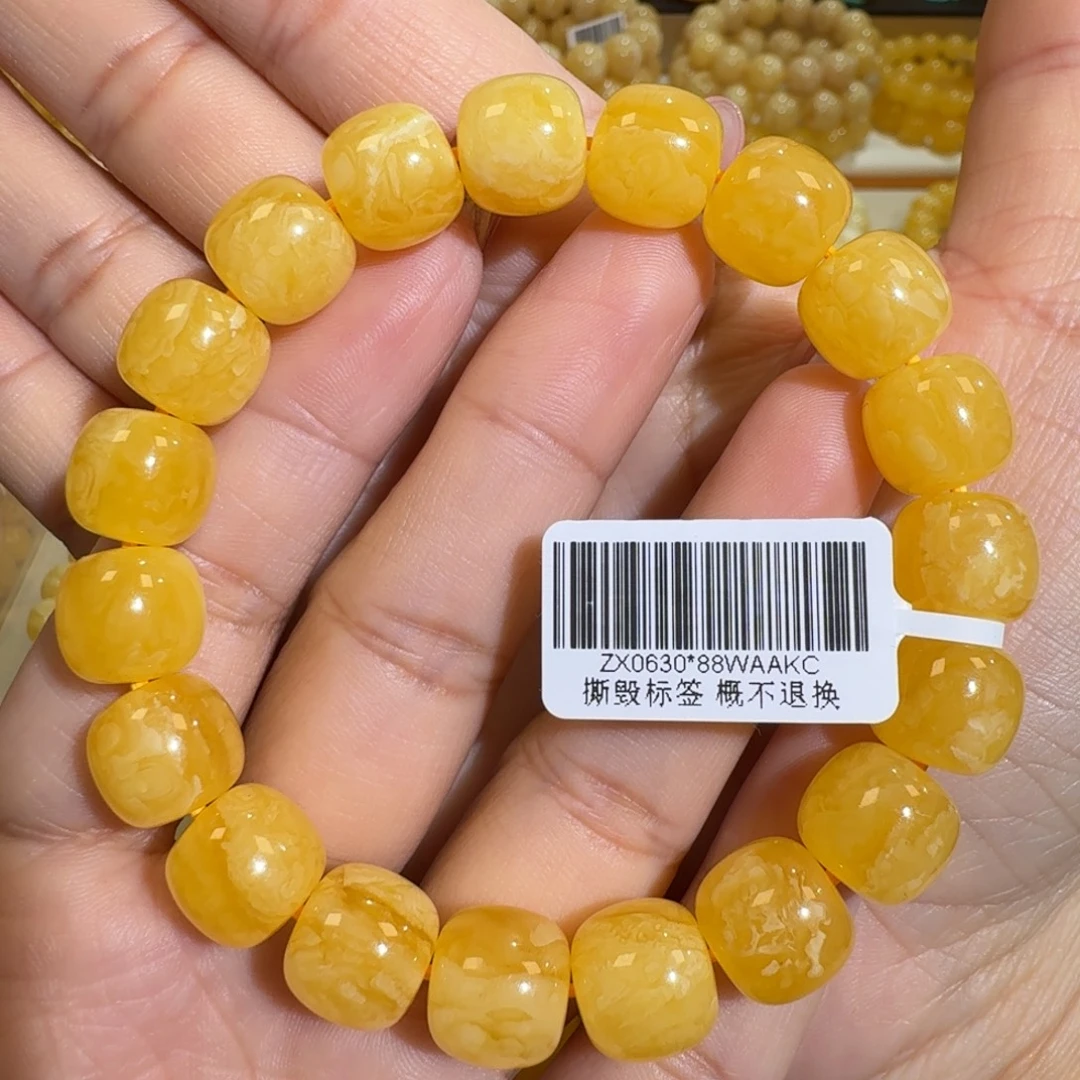 琥珀未镶嵌珠宝奇石11.8m焦皮同料橘黄花蜡手串18.9