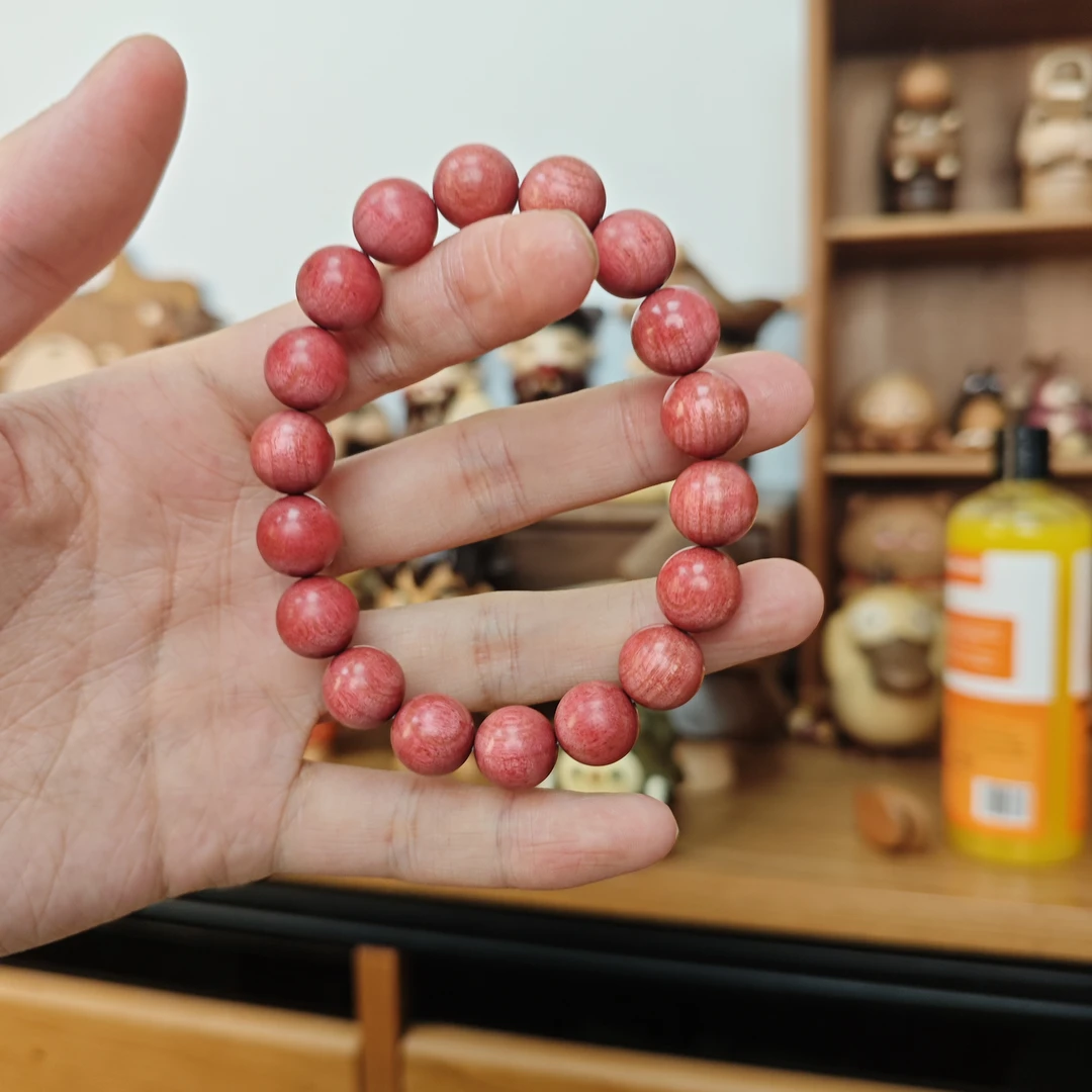 粉红像呀木桌面摆件原木