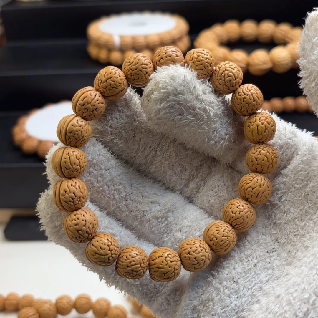 *****菩提籽类桃核野生金丹手串