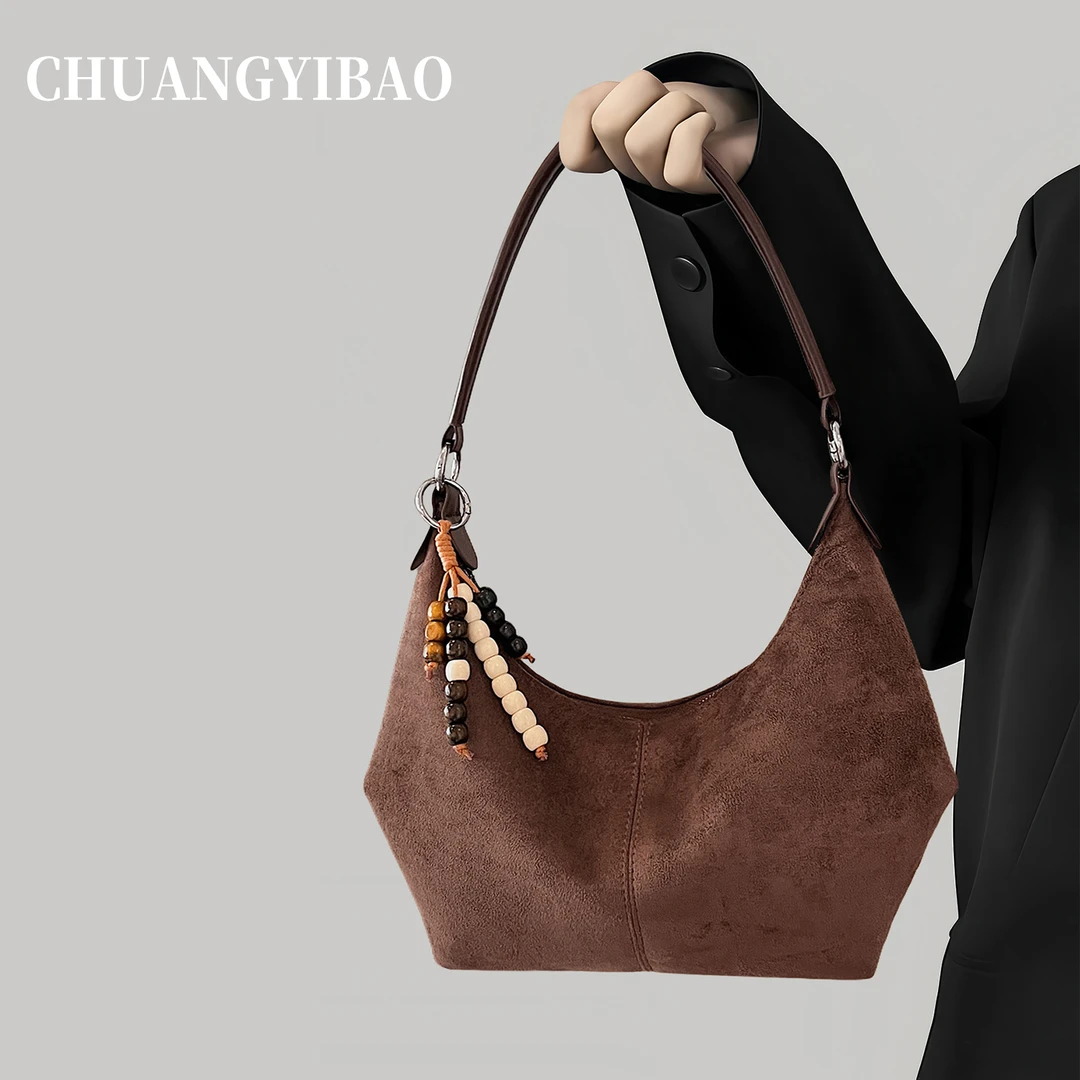 小众麂皮饺子腋下包女式2025新款秋冬高级质感百搭通勤单肩斜挎包