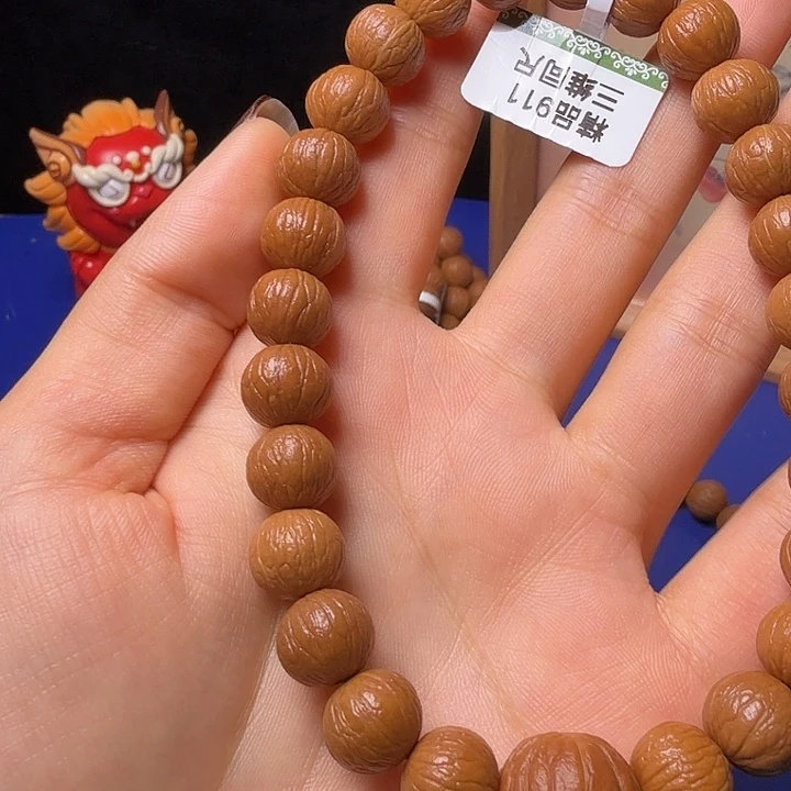 辛***盟手串猴头核桃凤羽