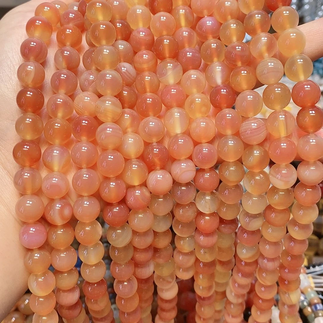 玛瑙/玉髓散珠10mm粉盐源溏心一条