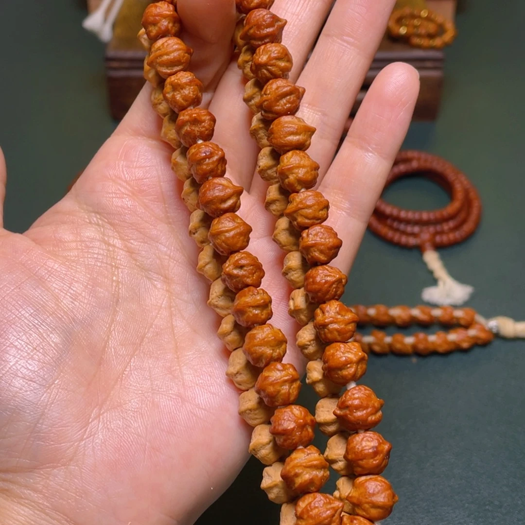 柏香籽/百香籽吊坠白牙横打手持