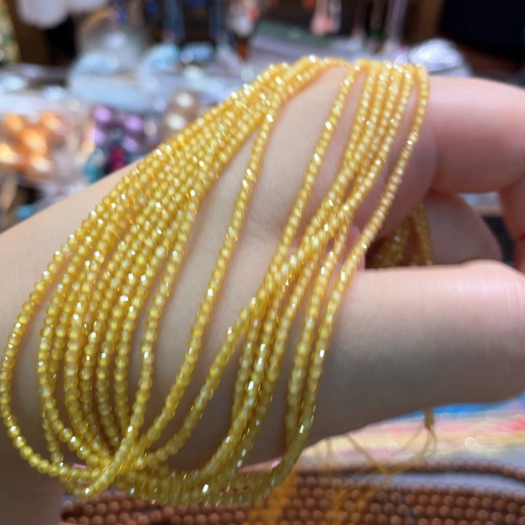 2mm黄色锆石切面米珠一条半成品散珠