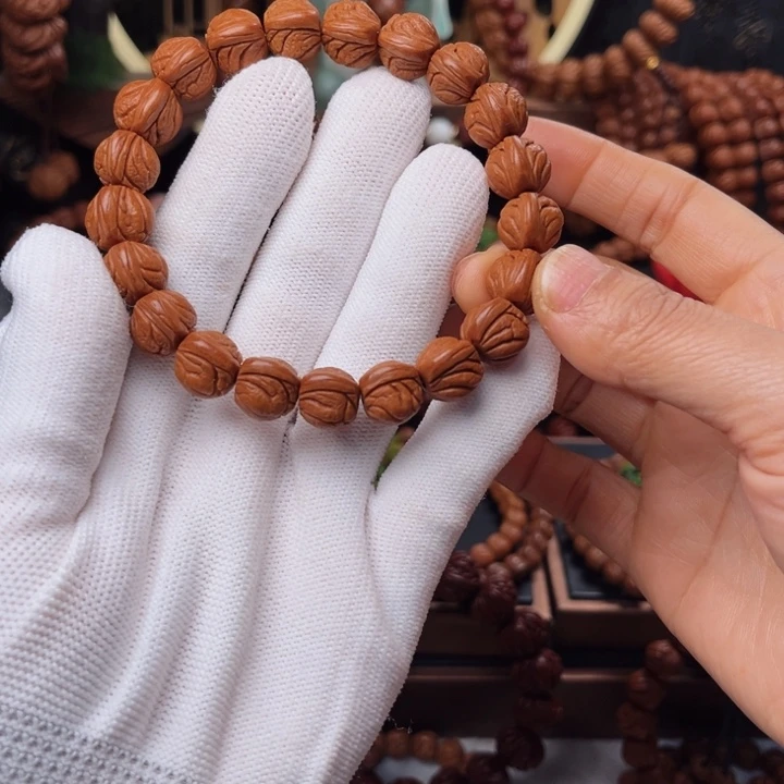 吊坠桃核12玉龙脊手串