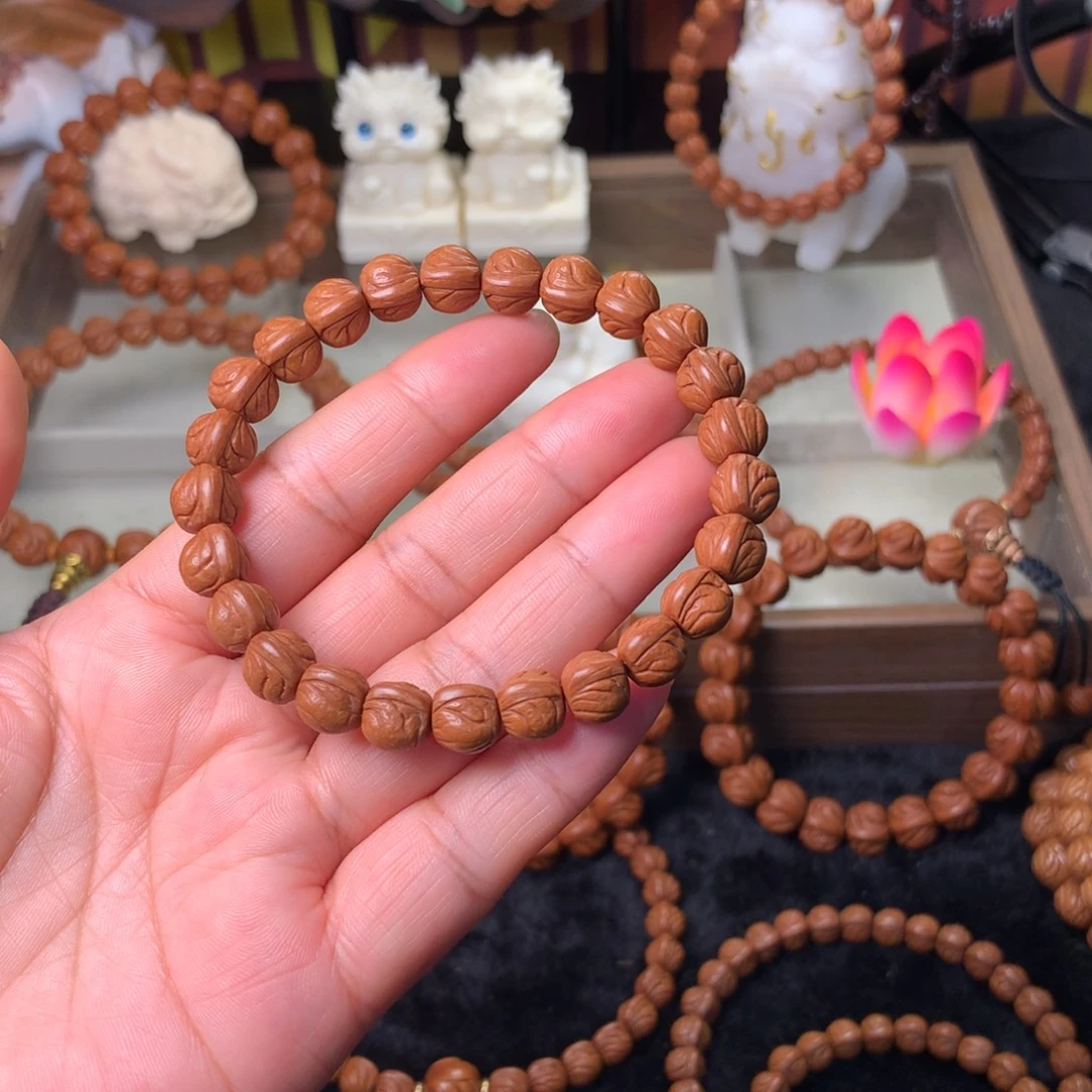 火***洋桃核吊坠玉龙脊手串09