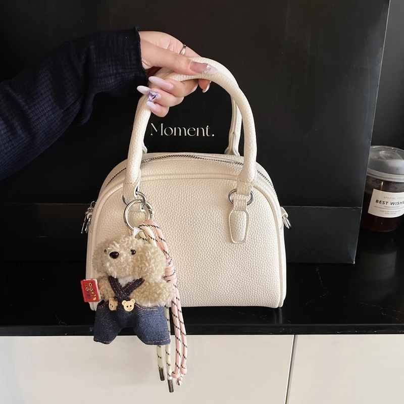 今年流行小众荔枝纹保龄球包手拎斜挎包女款小包包2025新款潮百搭