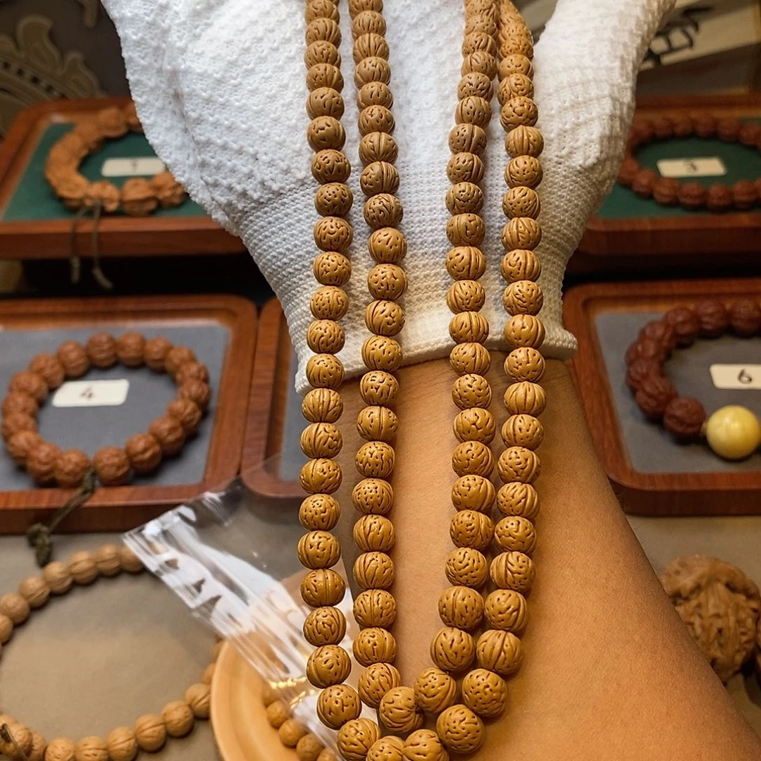 u***r文玩核桃手串桃核