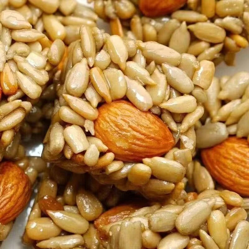 巴旦木瓜子仁酥葵花籽杏仁混合零食独立包装糖年货坚果工厂直发x