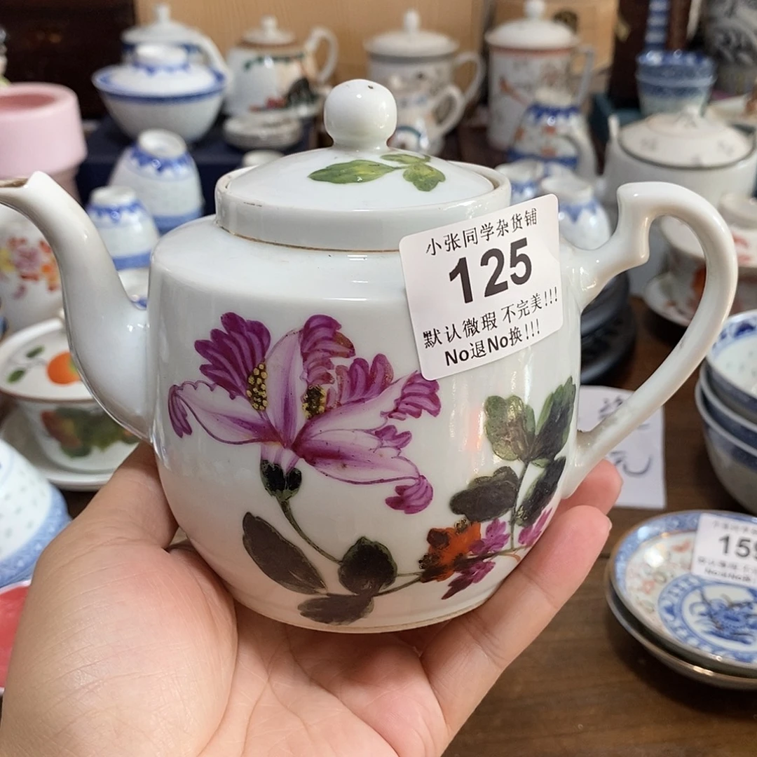 摆件圆章款紫色一枝花茶壶。就盖子里面一点点的小问题